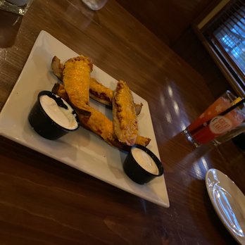Black Iron Grille - Loaded Potato Skins & unknown fruity drink. Bartender said he "had us". - Steakhouses Near Me - Kent, Ohio Black Iron Grille - Loaded Potato Skins & unknown fruity drink. Bartender said he "had us". - Steakhouses Near Me - Kent, Ohio