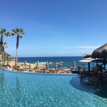 Esperanza, Auberge Collection - View from the infinity pool with Restaurant and ocean also swim up bar - Hotels Near Me - Cabo San Lucas, BCS Esperanza, Auberge Collection - View from the infinity pool with Restaurant and ocean also swim up bar - Hotels Near Me - Cabo San Lucas, BCS