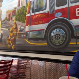 a fire truck painted on the wall