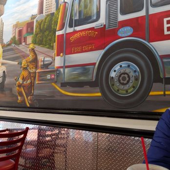 Firehouse Subs - a fire truck painted on the wall - Fast Food Near Me - Shreveport, Louisiana