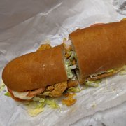 Photo of Mike Serio's Poboys - New Orleans, LA, United States. Shrimp poboy. We were able to split it.
