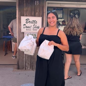 Britt's Donuts - My lovely daughter modeling for Britt's lol - Donuts Near Me - Carolina Beach, North Carolina