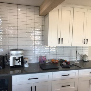 D Ciulla Flooring - a kitchen with white cabinets - Flooring Near Me - Kirkland, Washington