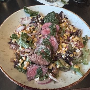 Foundry Fieldhouse - Steak salad with steak cooked medium rare. Delicious, so fresh and filling. - Sports Bars Near Me - Nashville, Tennessee Foundry Fieldhouse - Steak salad with steak cooked medium rare. Delicious, so fresh and filling. - Sports Bars Near Me - Nashville, Tennessee