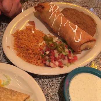 Chuy's - Chicken chimi- clearly one has to ask for extra sour cream - Tex-Mex Near Me - Gainesville, Florida