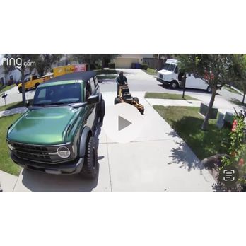 Indoor Pest Control, Sarasota | Bradenton, Your Green Team - a green truck parked in a driveway - Pest Control Near Me - Bradenton, Florida Indoor Pest Control, Sarasota | Bradenton, Your Green Team - a green truck parked in a driveway - Pest Control Near Me - Bradenton, Florida