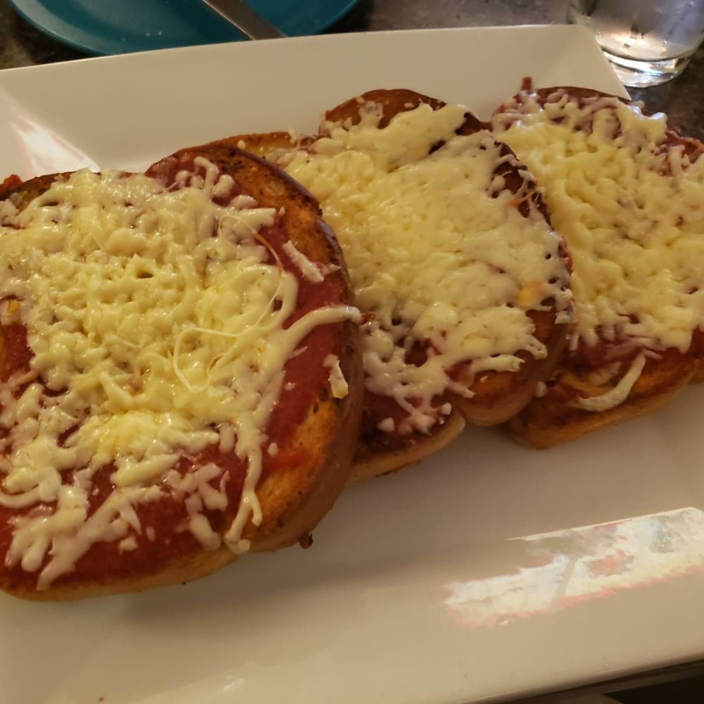 Falbo's Restaurant & Lounge - two slices of pizza on a plate - Pizza Near Me - Latrobe, Pennsylvania Falbo's Restaurant & Lounge - two slices of pizza on a plate - Pizza Near Me - Latrobe, Pennsylvania