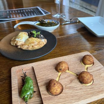 Plane & Level - Croquetas and Beef Sirloin Empanadas - Tapas Bars Near Me - Spring, Texas Plane & Level - Croquetas and Beef Sirloin Empanadas - Tapas Bars Near Me - Spring, Texas