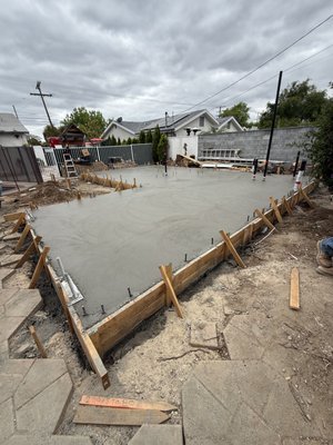 Residential Concrete Solutions - With over 27 years of experience, RCA Concrete Inc. stands as a leading provider of high-quality concrete services in Palmdale and Los Angeles, California. Our expertise spans both residential and commercial sectors, delivering durable and aesthetically pleasing results tailored to each client's needs.
Residential Concrete Services:
Driveways & Walkways: Custom-designed pathways that enhance curb appeal and functionality.
Patios & Outdoor Living Spaces: Beautifully crafted areas for relaxation and entertainment.
Decorative Concrete: Stamped and stained finishes that add unique character to your home.
Foundations & Slabs: Solid bases ensuring the longevity and stability of your structures.
Commercial Concrete Services:
Structural Foundations: Robust and reliable bases for commercial buildings.
Parking Lots & Driveways: Efficiently designed for durability and heavy traffic.
Sidewalks & Curbs: Precision-built to meet city regulations and enhance accessibility.
Masonry, Pavers, & Stone Work: Expertly installed to elevate the aesthetic and functional aspects of commercial spaces.
At RCA Concrete Inc., we are committed to delivering projects that not only meet but exceed expectations. Our team combines technical proficiency with creative design to produce concrete work that is both functional and visually appealing.
Why Choose Us:
Experience: Over two decades of industry knowledge and hands-on expertise.
Quality Craftsmanship: Attention to detail in every project, ensuring superior results.
Customer Satisfaction: Dedicated to building lasting relationships through exceptional service. Residential Concrete Solutions - With over 27 years of experience, RCA Concrete Inc. stands as a leading provider of high-quality concrete services in Palmdale and Los Angeles, California. Our expertise spans both residential and commercial sectors, delivering durable and aesthetically pleasing results tailored to each client's needs.
Residential Concrete Services:
Driveways & Walkways: Custom-designed pathways that enhance curb appeal and functionality.
Patios & Outdoor Living Spaces: Beautifully crafted areas for relaxation and entertainment.
Decorative Concrete: Stamped and stained finishes that add unique character to your home.
Foundations & Slabs: Solid bases ensuring the longevity and stability of your structures.
Commercial Concrete Services:
Structural Foundations: Robust and reliable bases for commercial buildings.
Parking Lots & Driveways: Efficiently designed for durability and heavy traffic.
Sidewalks & Curbs: Precision-built to meet city regulations and enhance accessibility.
Masonry, Pavers, & Stone Work: Expertly installed to elevate the aesthetic and functional aspects of commercial spaces.
At RCA Concrete Inc., we are committed to delivering projects that not only meet but exceed expectations. Our team combines technical proficiency with creative design to produce concrete work that is both functional and visually appealing.
Why Choose Us:
Experience: Over two decades of industry knowledge and hands-on expertise.
Quality Craftsmanship: Attention to detail in every project, ensuring superior results.
Customer Satisfaction: Dedicated to building lasting relationships through exceptional service.