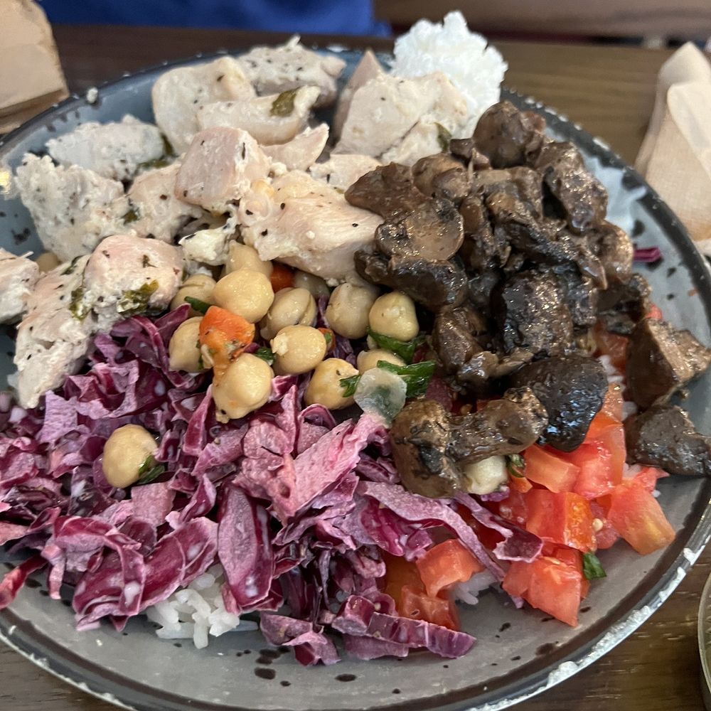 YAFO Kitchen - Rice, chicken, chickpeas, mushrooms, tomatoes and cabbage slaw! - Mediterranean Near Me - Charlotte, North Carolina