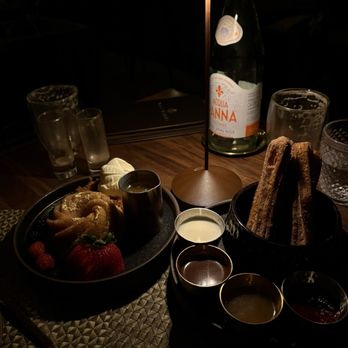 Toca Madera Las Vegas - brown butter cake and churros with dipping sauces - Steakhouses Near Me - Las Vegas, Nevada Toca Madera Las Vegas - brown butter cake and churros with dipping sauces - Steakhouses Near Me - Las Vegas, Nevada
