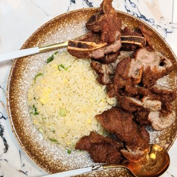 Supreme Dumplings - Pork Chop Fried Rice. Very flavorful, tender pork chop. Flavorful fried rice. - Shanghainese Near Me - Bellevue, Washington Supreme Dumplings - Pork Chop Fried Rice. Very flavorful, tender pork chop. Flavorful fried rice. - Shanghainese Near Me - Bellevue, Washington