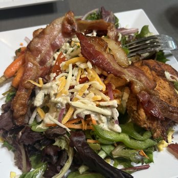Crossroads Cafe - a plate of salad with bacon, lettuce, carrots, and other vegetables - Cafes Near Me - Rocklin, California