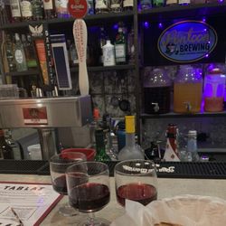 Madrid Spanish Taverna - The wine flight. It had a wine from Turkey! Different. Another had a hint of coffee bean. Liked the Argentina red.