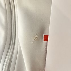 Super Dry Clean City - Ripped jacket from terrible service