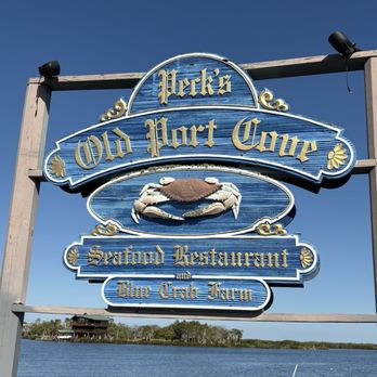 Peck's Old Port Cove - Signage by the water - Seafood Near Me - Crystal River, Florida Peck's Old Port Cove - Signage by the water - Seafood Near Me - Crystal River, Florida