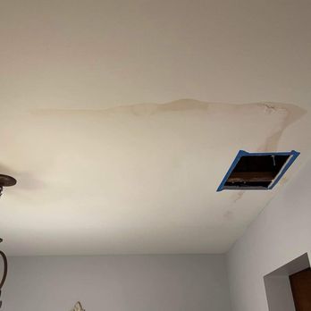 EBR Painting - Before. Dining room ceiling hole and water damage. - Painters Near Me