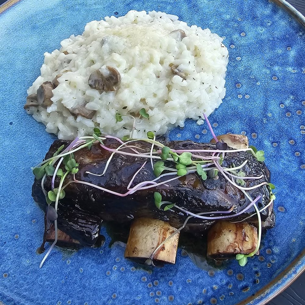 Highlands Golf Club - Bison short ribs with mushroom rissoto - Golf Near Me - Edmonton, Alberta Highlands Golf Club - Bison short ribs with mushroom rissoto - Golf Near Me - Edmonton, Alberta