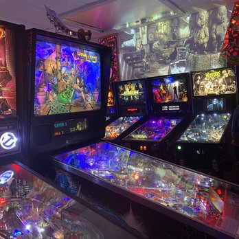 Starfighters Arcade - Pinball machines with a movie projected onto the wall - Arcades Near Me - Mesa, Arizona