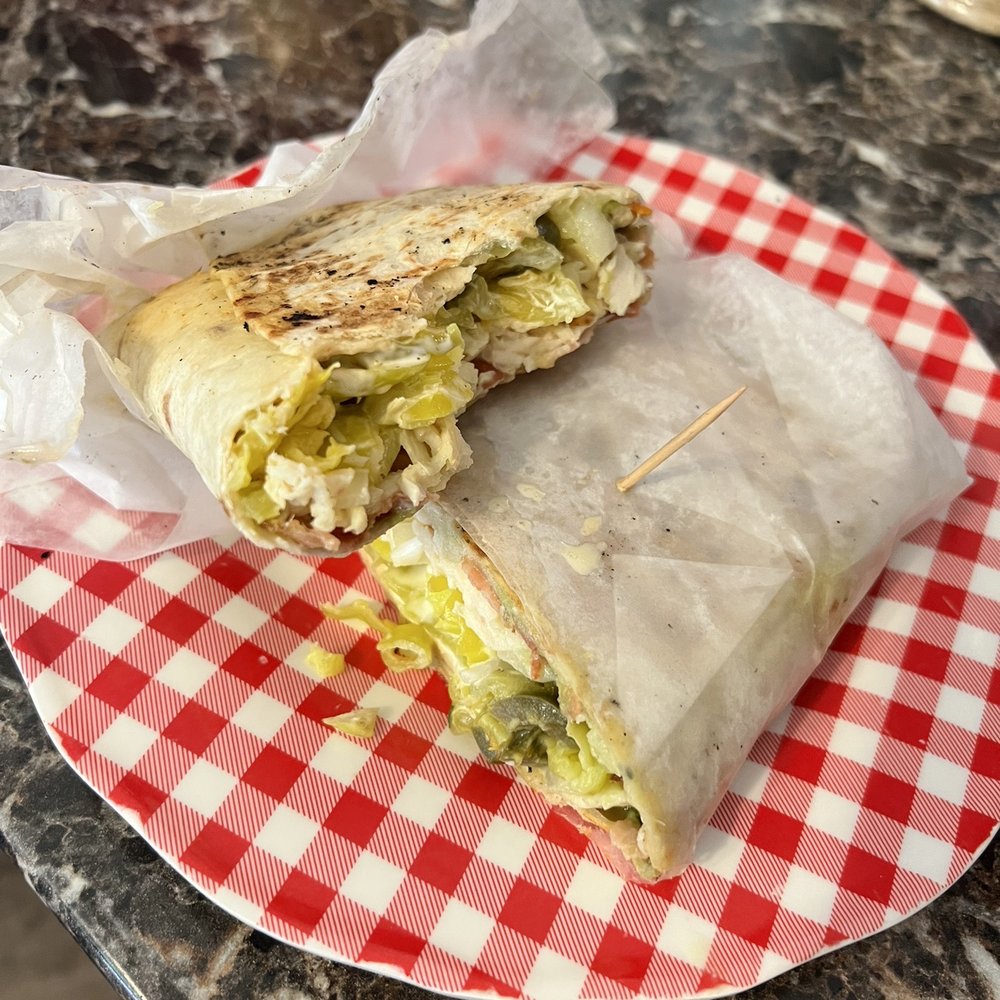 Russo's Cheesecakes and Deli - Rebecca's Wrap. Spicy with some pickle and banana peppers. - Desserts Near Me - Prescott, Arizona Russo's Cheesecakes and Deli - Rebecca's Wrap. Spicy with some pickle and banana peppers. - Desserts Near Me - Prescott, Arizona