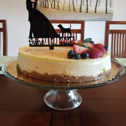 a cake with a silhouette of a bride and groom a cake with a silhouette of a bride and groom