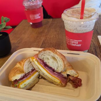 San Fernando Coffee Company - Cheddar egg Croissant (Bacon & Ham w/ a side of Chipotle aioli) - Coffee & Tea Near Me - Paramount, California San Fernando Coffee Company - Cheddar egg Croissant (Bacon & Ham w/ a side of Chipotle aioli) - Coffee & Tea Near Me - Paramount, California