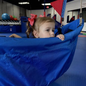 We Rock The Spectrum - Bradenton - Fun boat-like swing - Indoor Playcenter Near Me - Bradenton, Florida