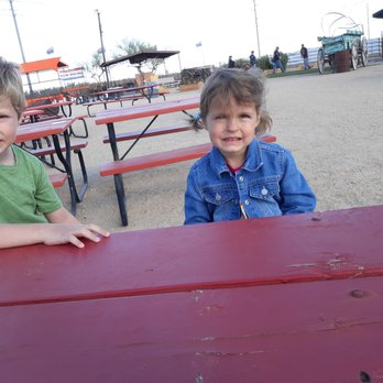 Dillon's at Western Trails Ranch - The kids outside at a picnic table.  This place is huge! - Barbeque Near Me - Morristown, Arizona