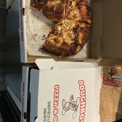 Doughboy's Pizza & Wings - Burnt pizza