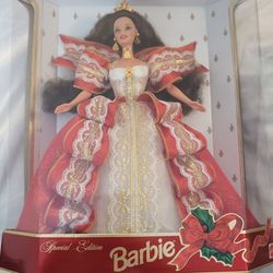 Pudik’s Antiquities & More - 1997 holiday barbie.