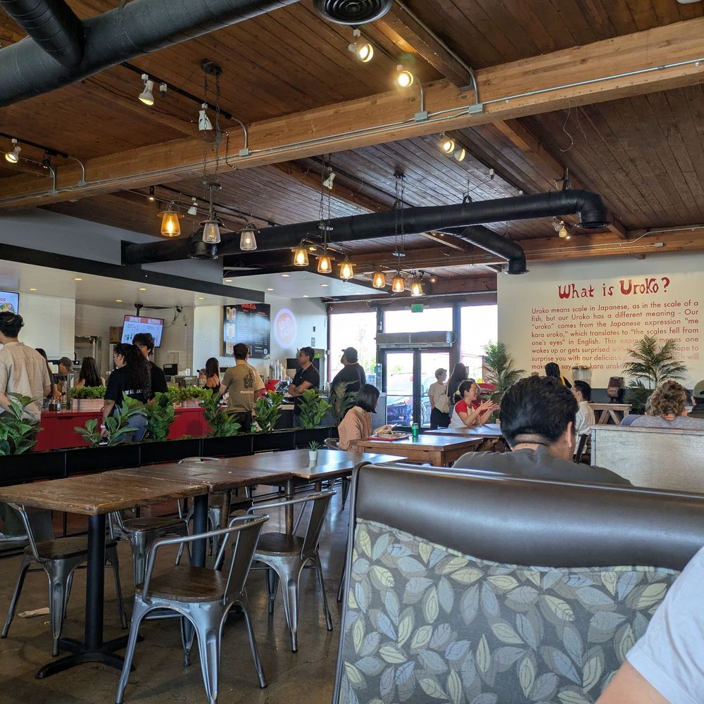 Uroko Poke - Interior. Tables look worn out, but the space is open and clean - Japanese Near Me - Costa Mesa, California Uroko Poke - Interior. Tables look worn out, but the space is open and clean - Japanese Near Me - Costa Mesa, California