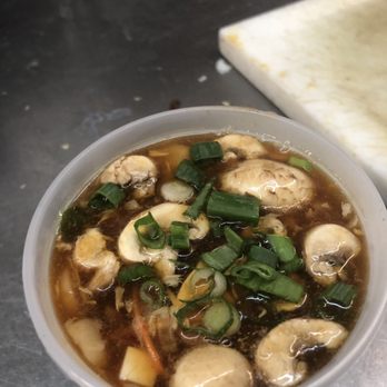 Golden China - a bowl of soup on a table - Chinese Near Me - Dolton, Illinois Golden China - a bowl of soup on a table - Chinese Near Me - Dolton, Illinois