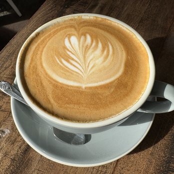 Neptune's - Talented coffee artist does a great latte - New American Near Me - Alameda, California