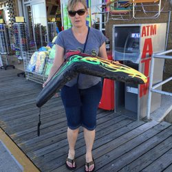 Romano's Beach Store - Broken boogie board