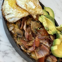 Nova’s Breakfast & Brunch - Farmers Makest customized to add cheddar cheese, no Beraniase sauce, add chopped bacon.