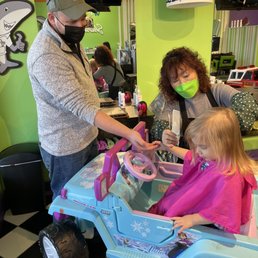 Hair cut with our incredible stylist! In an Frozen Jeep watching frozen.