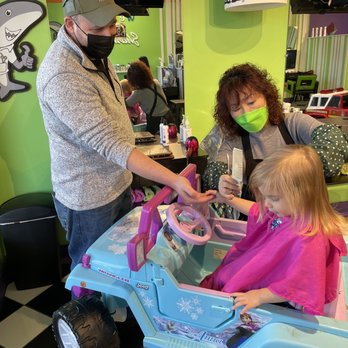 Sharkey's Cuts for Kids - Hair cut with our incredible stylist! In an Frozen Jeep watching frozen. - Kids Hair Salons Near Me - Centreville, Virginia