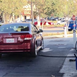 Chevron - I just saw this guy drive off with the hose still attached!