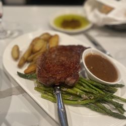 Antica Italian - Ribeye with port reduction sauce and roasted potatoes