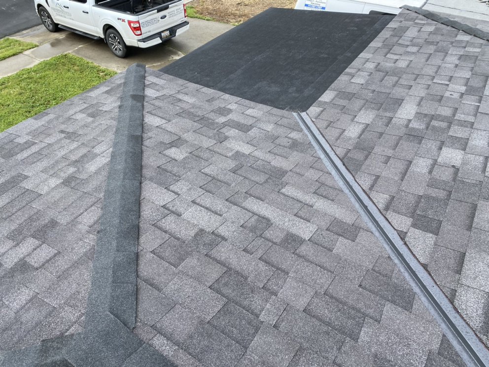 Slide of Modern Roofers and Restoration