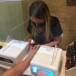 Haven Salon & Spa - Shellac nail manicure with plexiglass, masks, disinfectant and other safety protocols in place.
