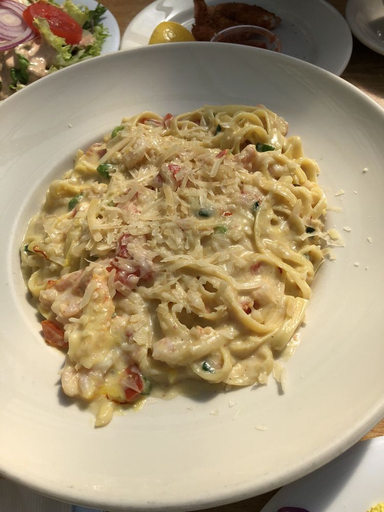 Order Fettuccine With Crabmeat and Bay Shrimp food online from Phil's Fish Market and Eatery store, Moss Landing on bringmethat.com