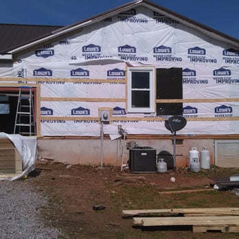 American Pro Siding and Roofing - House in campobello sc we installed metal roof new windows new batting board siding n rock - Siding Near Me American Pro Siding and Roofing - House in campobello sc we installed metal roof new windows new batting board siding n rock - Siding Near Me