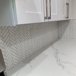 Backsplash -White Polished Herringbone Thassos.