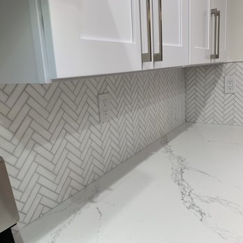 California Wholesale Tile - Backsplash -White Polished Herringbone Thassos. - Building Supplies Near Me - Anaheim, California