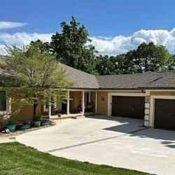 Peak25 Roofing - Lake Winnebago MO Gutters Front