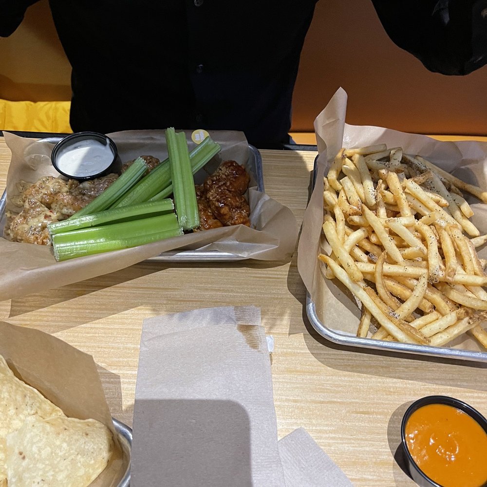 Buffalo Wild Wings - Boneless wings and seasoned fries - Chicken Wings Near Me - Brighton, Michigan Buffalo Wild Wings - Boneless wings and seasoned fries - Chicken Wings Near Me - Brighton, Michigan