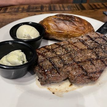 Local Goat - 10 oz Center-Cut Sirloin with baked potato - New American Near Me - Pigeon Forge, Tennessee Local Goat - 10 oz Center-Cut Sirloin with baked potato - New American Near Me - Pigeon Forge, Tennessee