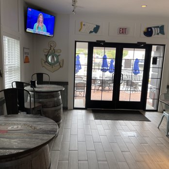 DJ’s Clam Shack - View of patio from dining area - Seafood Near Me - Huntington, New York DJ’s Clam Shack - View of patio from dining area - Seafood Near Me - Huntington, New York