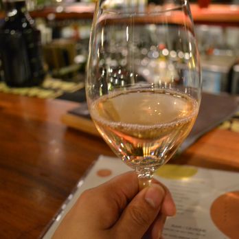Extra Virgin - A glass of Pinot Grigio. - Tapas/Small Plates Near Me - Kansas City, Missouri Extra Virgin - A glass of Pinot Grigio. - Tapas/Small Plates Near Me - Kansas City, Missouri